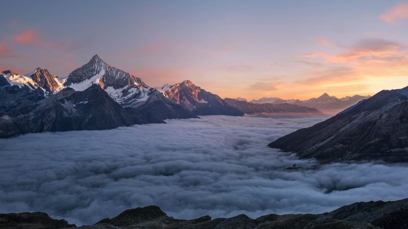 aerial photo of foggy mountains