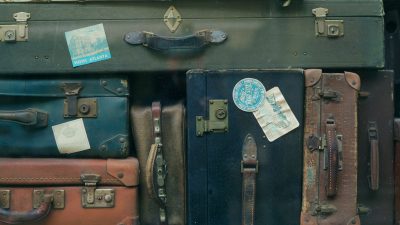 stack of assorted-color suit case lot