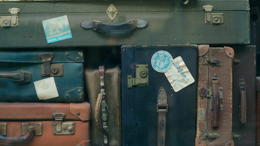 stack of assorted-color suit case lot